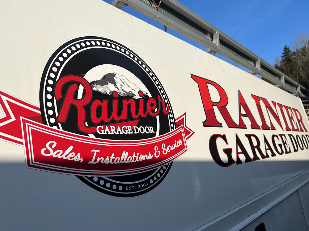 Rainier Garage Door White Truck Logo Picture