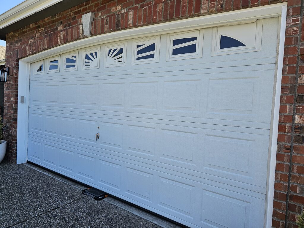New Garage Door Being Weight